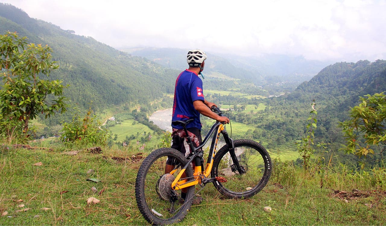 Mountain-bike-through-incredible-landscape-in-Nepal.jpg