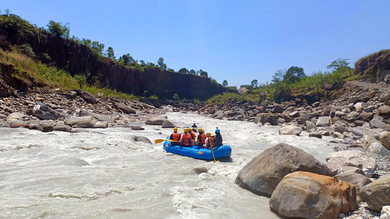 Group of people are rafting in the thrilling rapids of Upper Seti River in Pokhara.