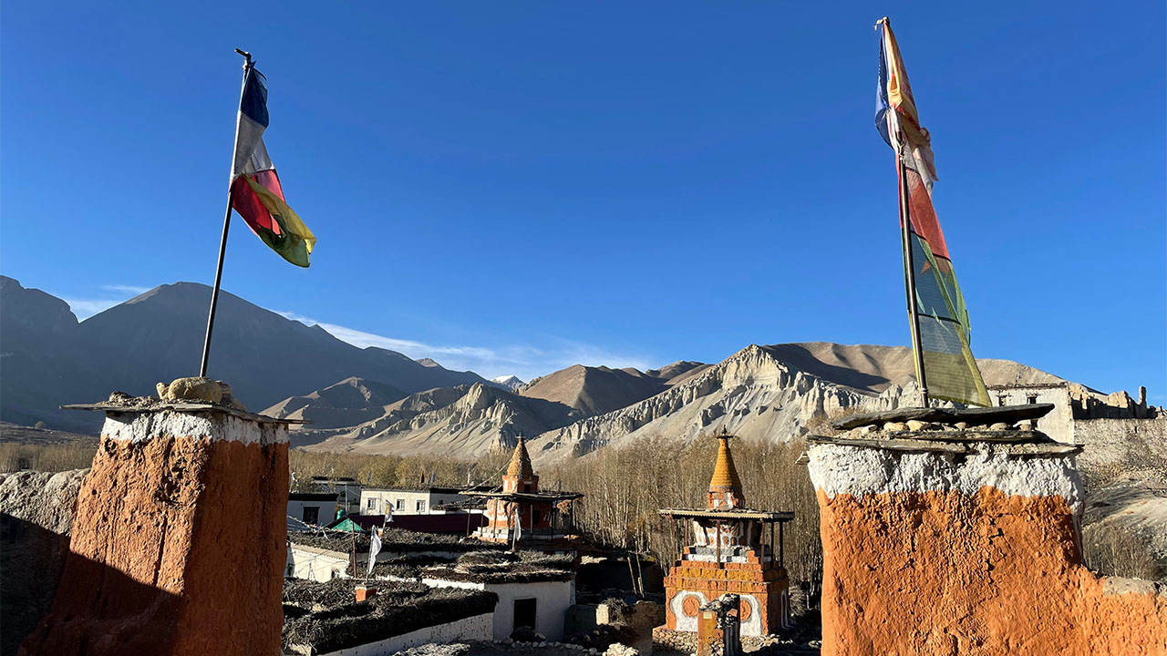 Beautiful village of Mustang with prayer flags and chortens.