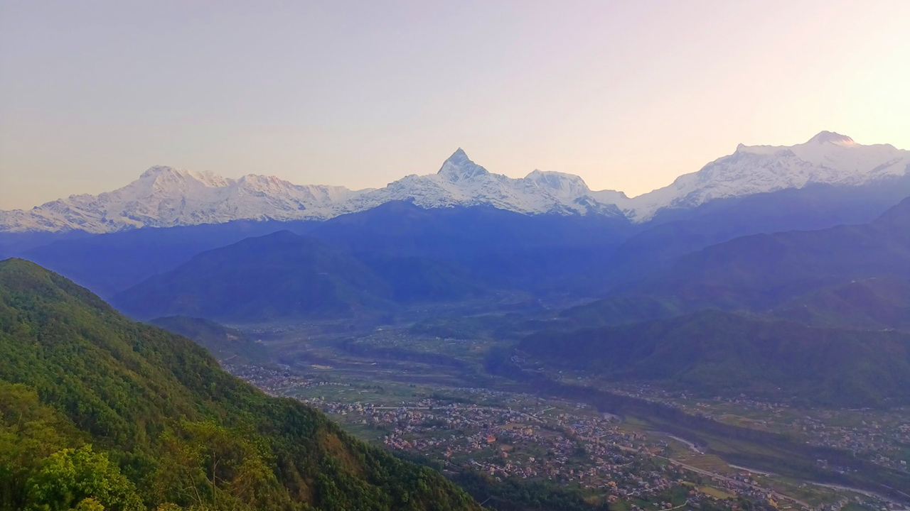 The view of Annapurna mountain range with Fishtail in the middle is seen from the Sarangkot view point in Pokhara, Nepal.