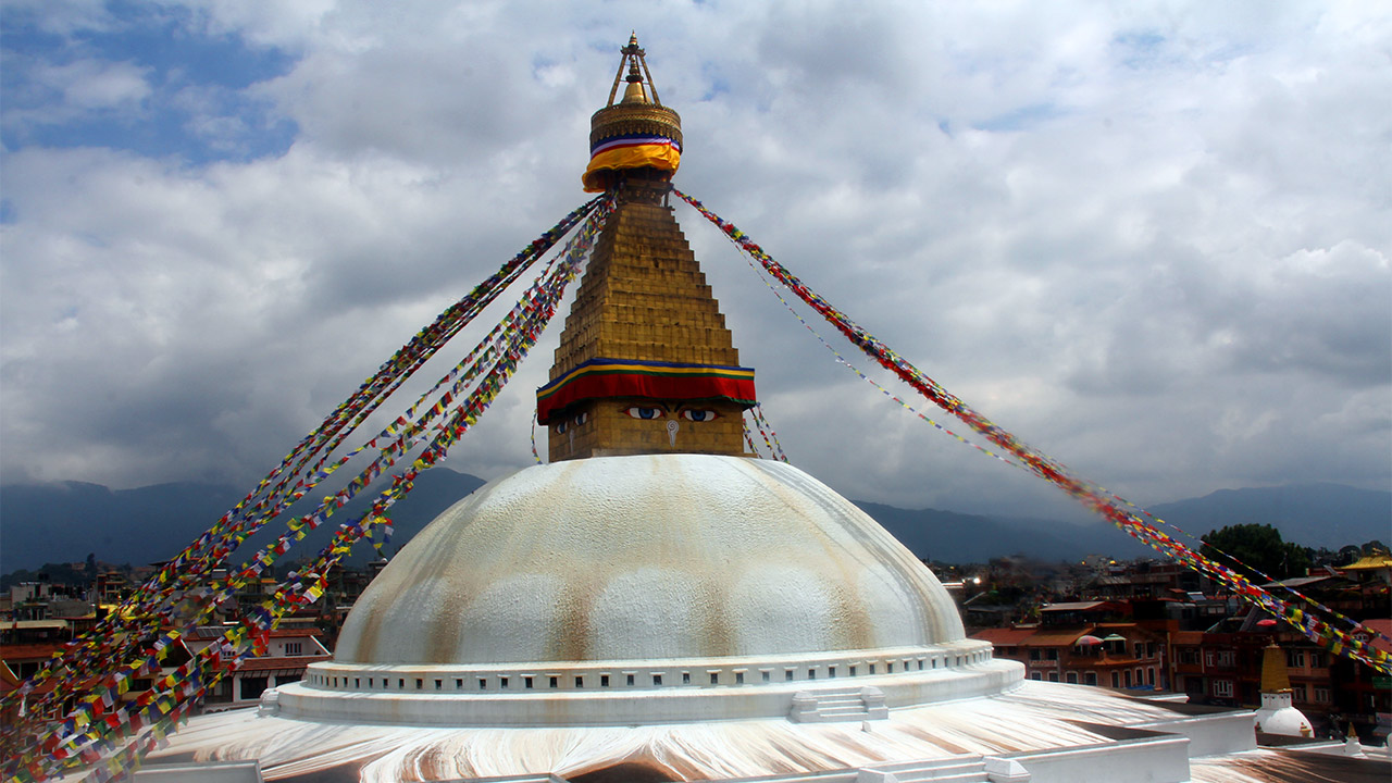 Boudhanath stupa of Kathmandu decorated with prayer flags.