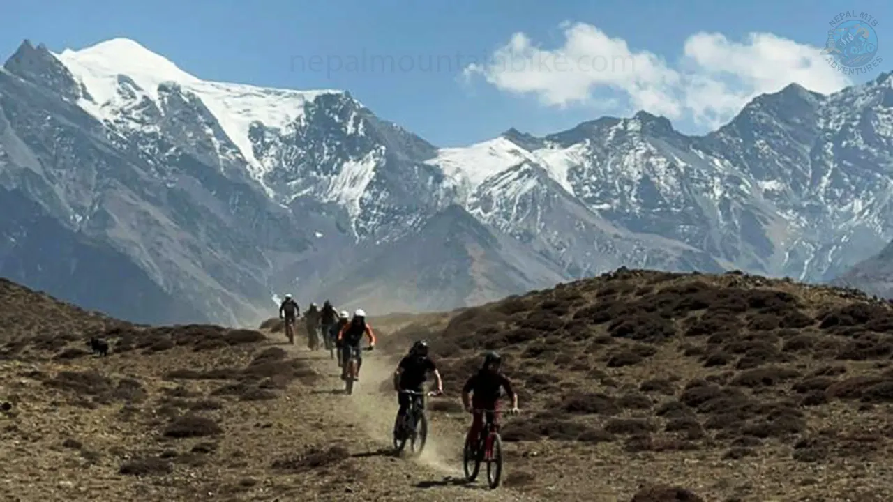 Mountain bikers are riding the Lupra singletrack in Mustang during Nepal MTB guided tour. 