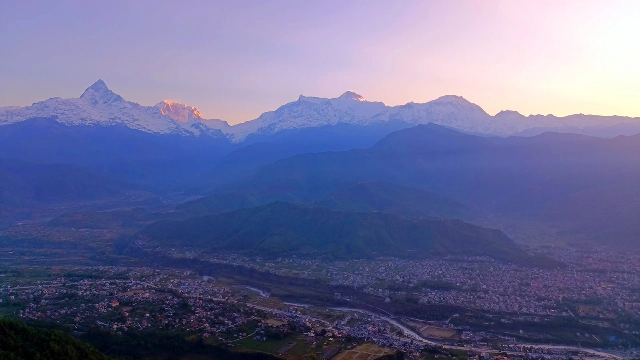 Sunrise view from Sarangkot during Nepal E-MTB cycling adventure.